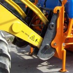 Wheel loader hitch for SWC sweeper