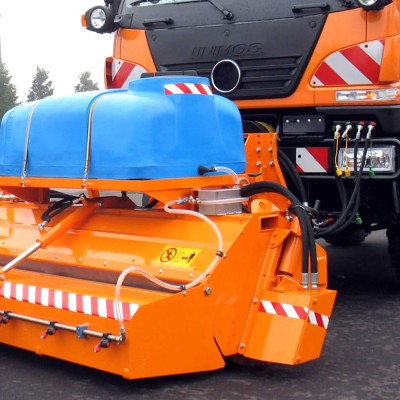 Dust suppression kit for SWC sweeper